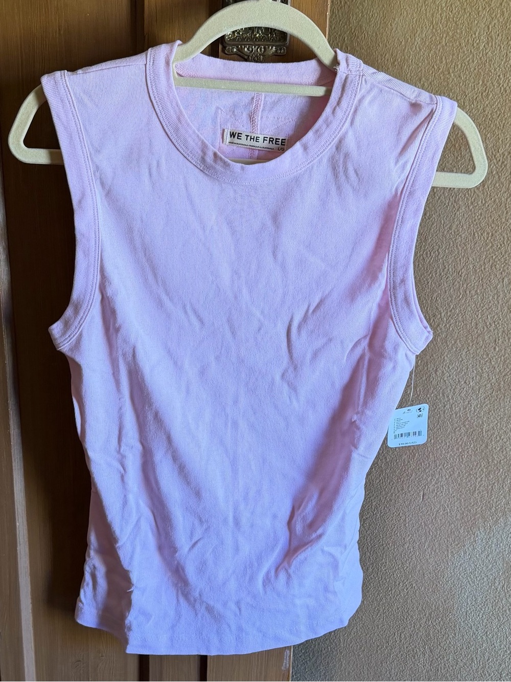 BNWT  “ We the free” soft pink size large ribbed tank